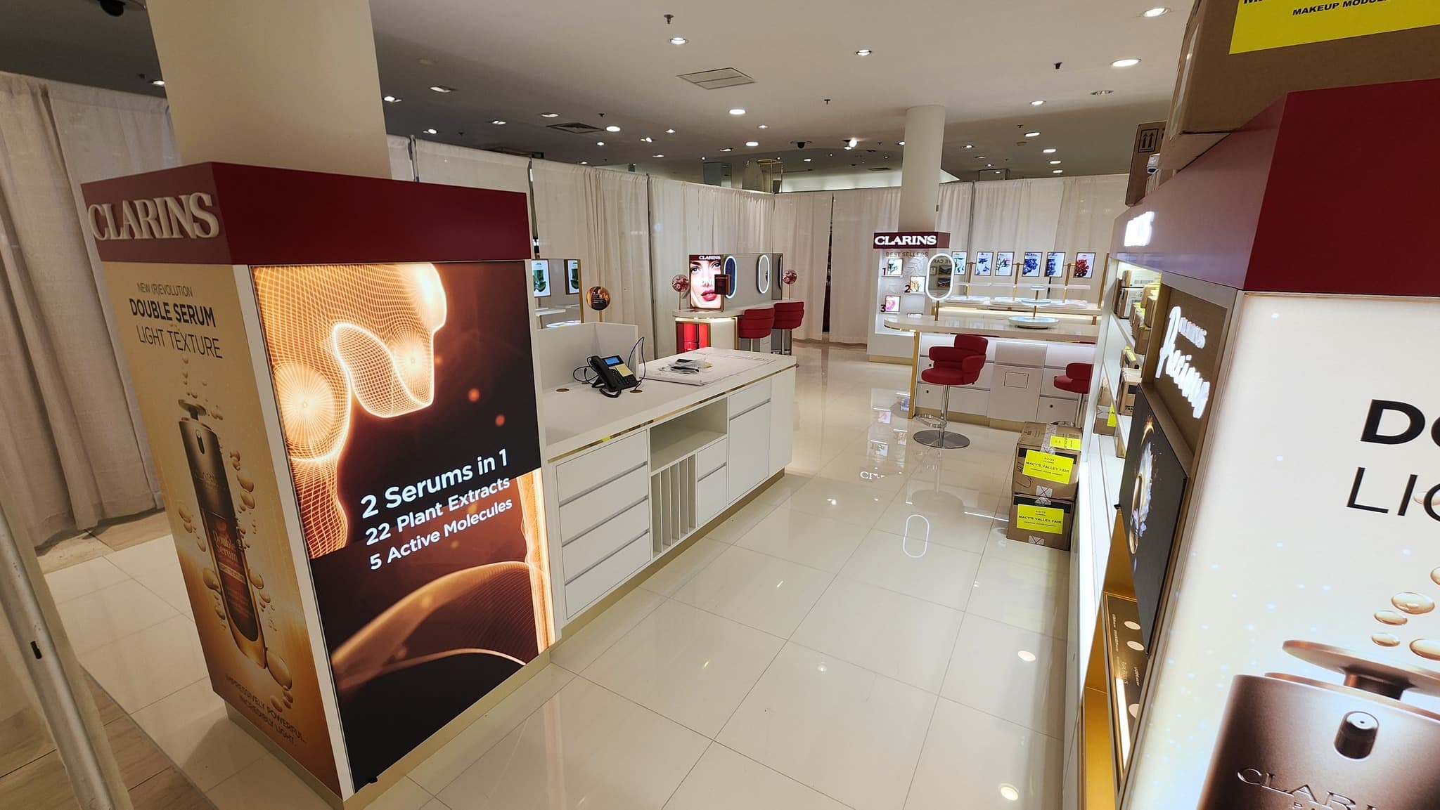Clarins Pop-Up Retail Display Install in Modesto - One-week install of pre-made European fixtures with lighted mirrors and illuminated product towers