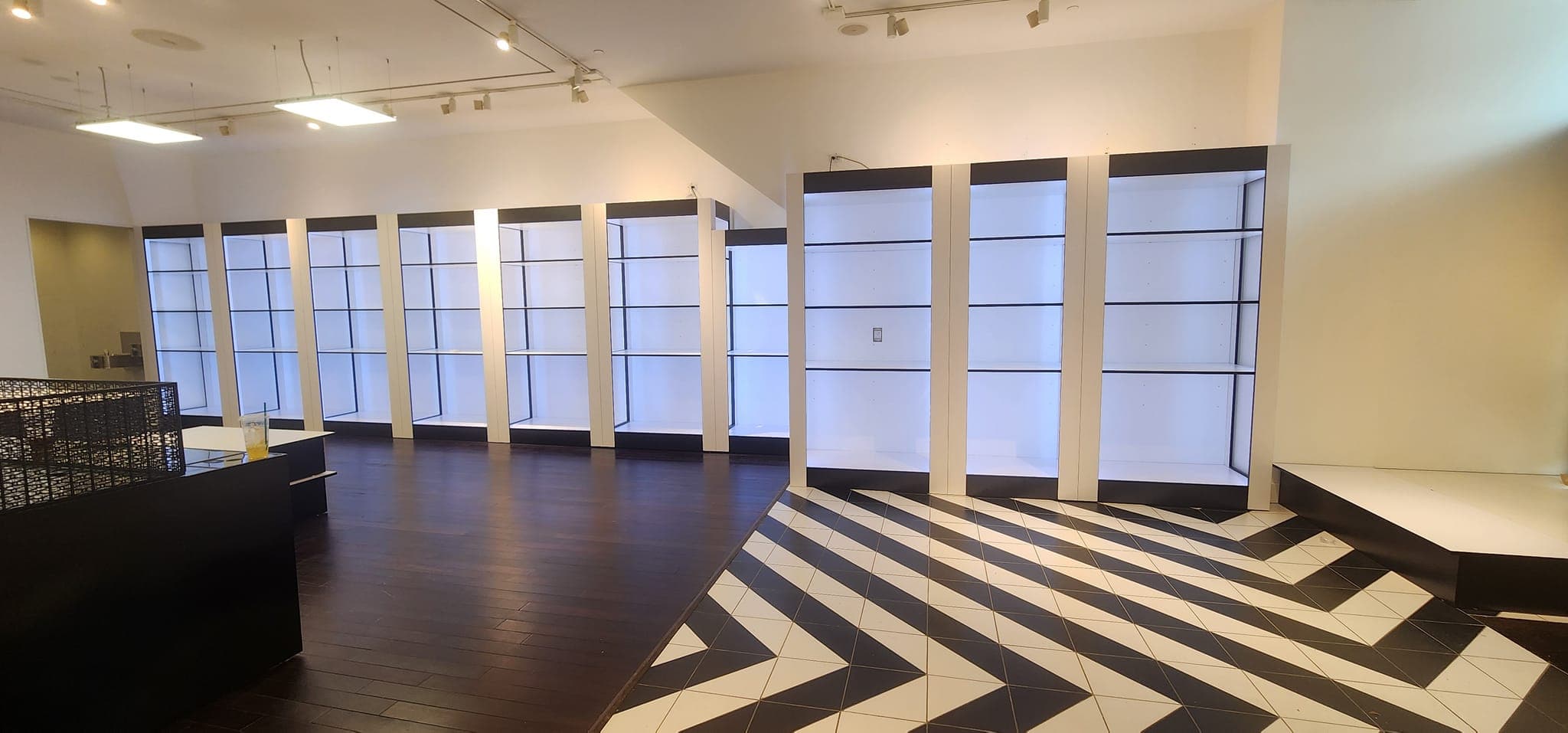 Retail Display Build in Los Gatos, CA - 50 ft laminate wall display with integrated LED strip lighting